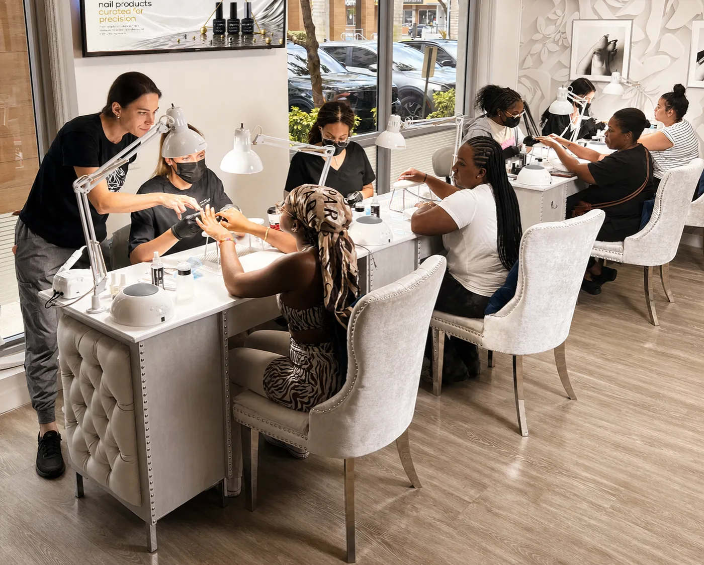 Siranush Ambartsumian teaching a small-group nail class at Nail Art Department in Hallandale Beach